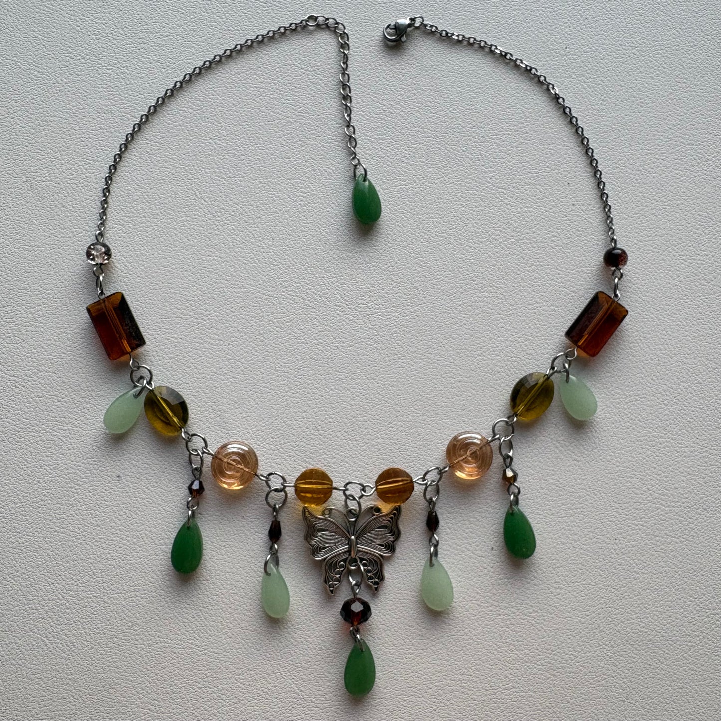 brown and green butterfly necklace