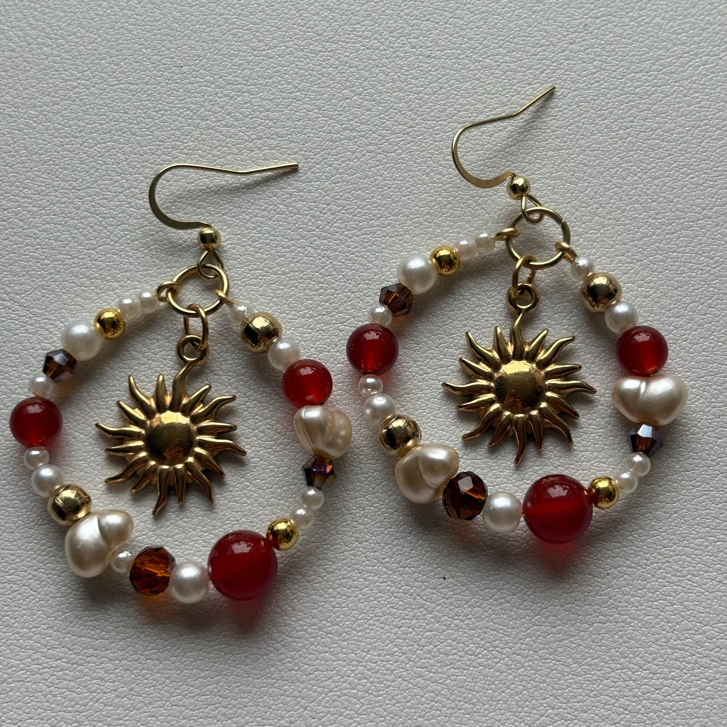 regret me earrings