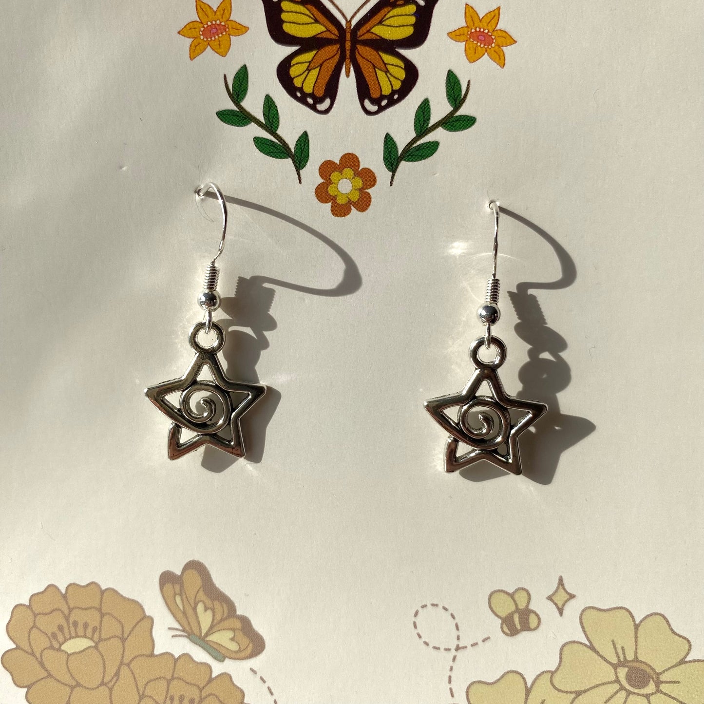 anomaly star earrings