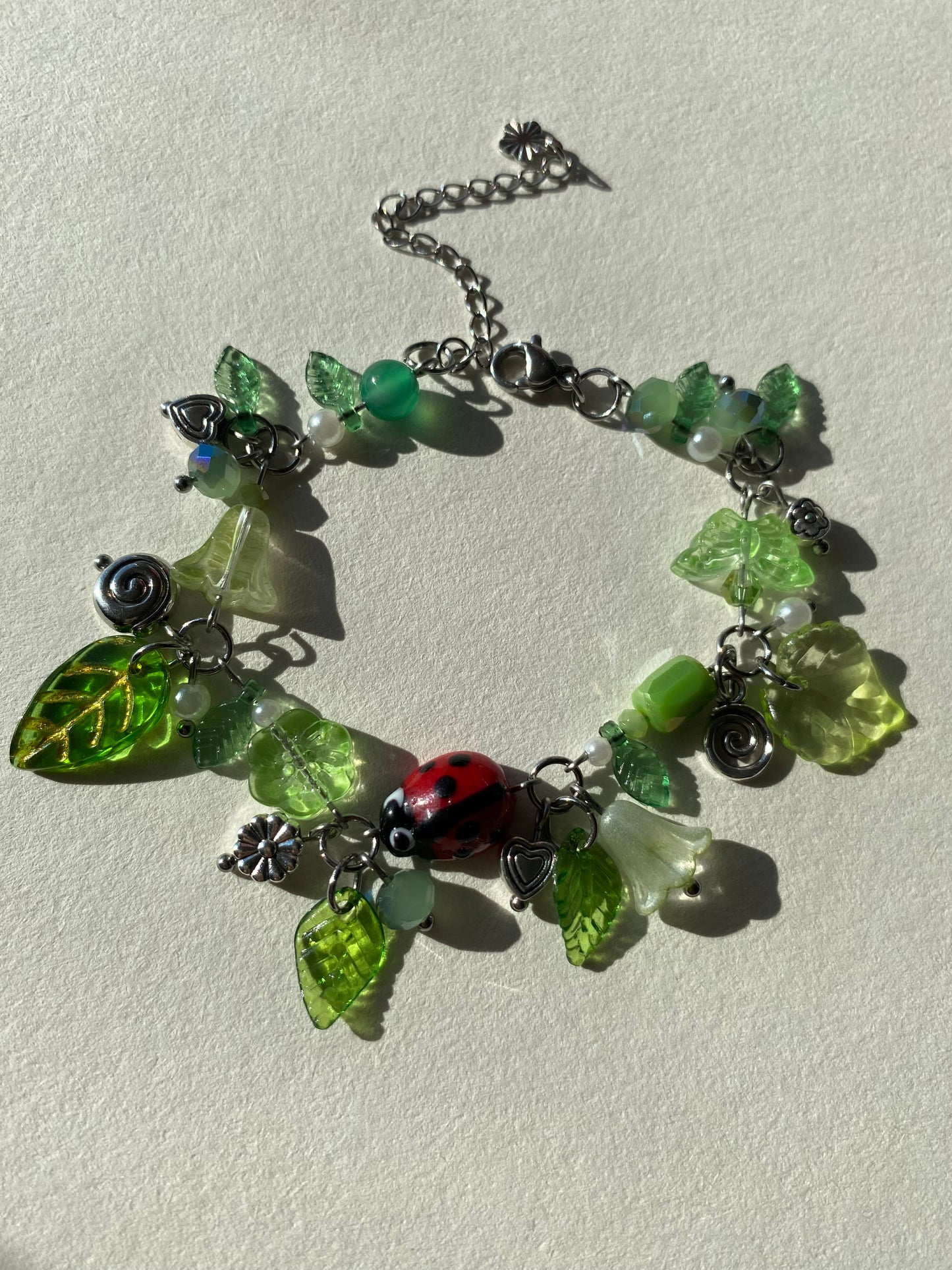 ladybug swirl clutter charm bracelet