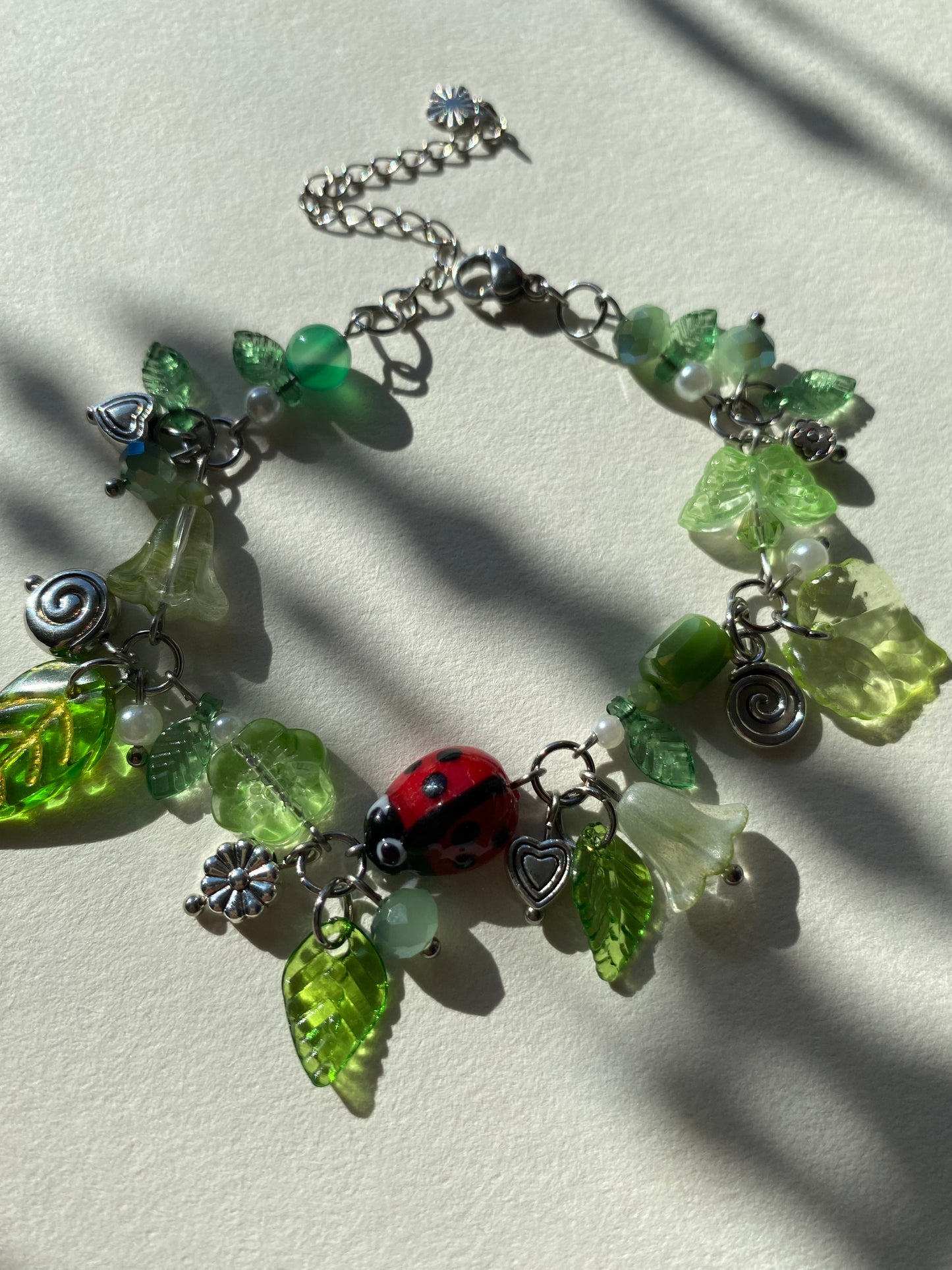 ladybug swirl clutter charm bracelet