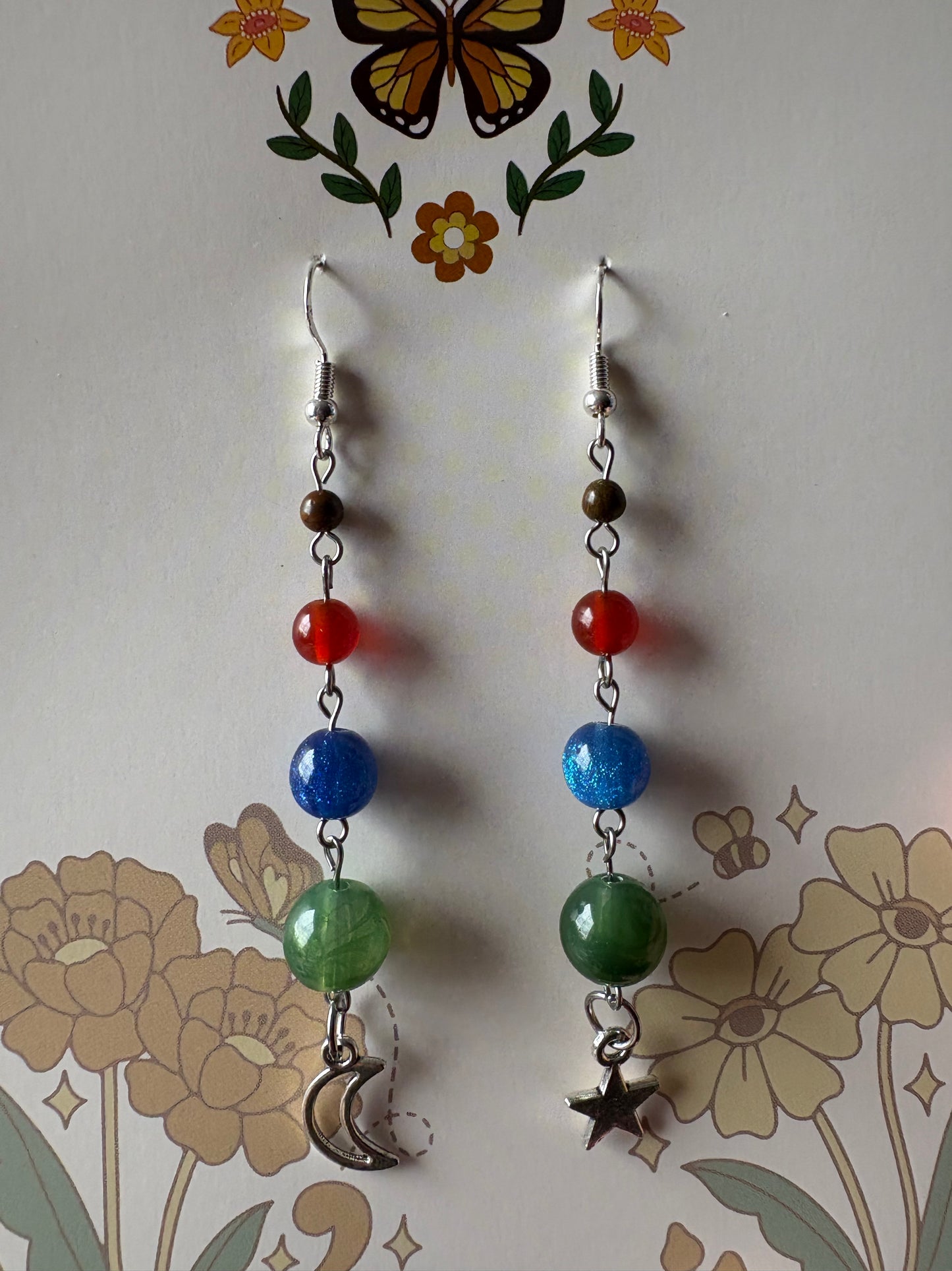 silver sparkling solar system earrings