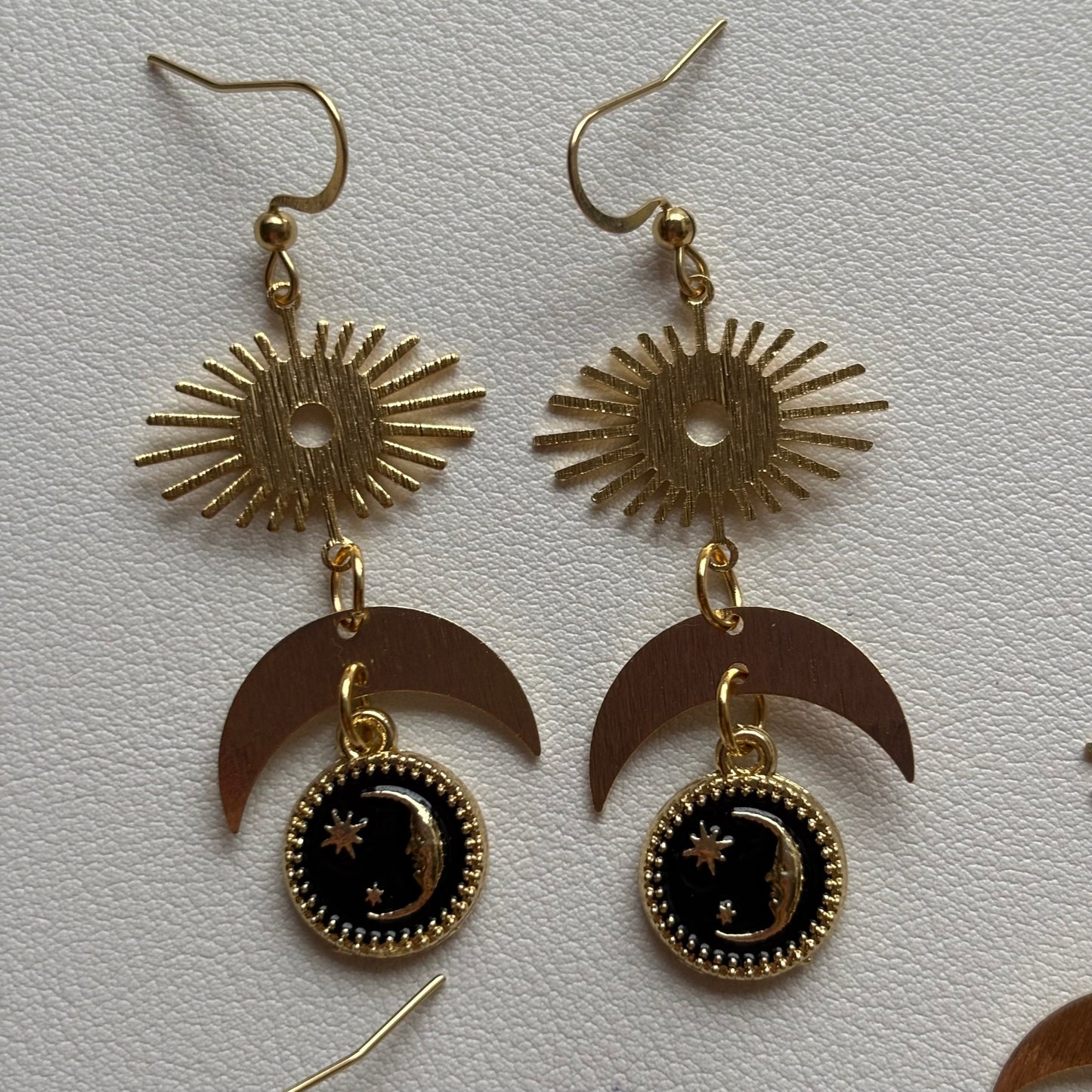 whimsical sun and moon earrings