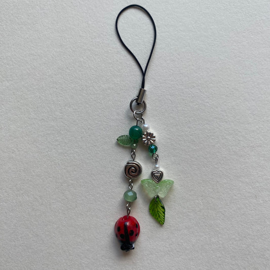 ladybug swirl phone charm