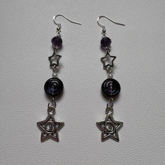 purple anomaly earrings