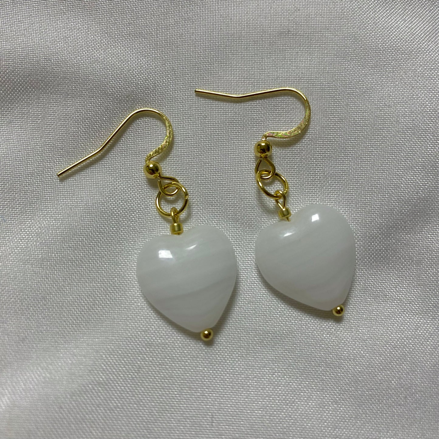 white glass heart earrings