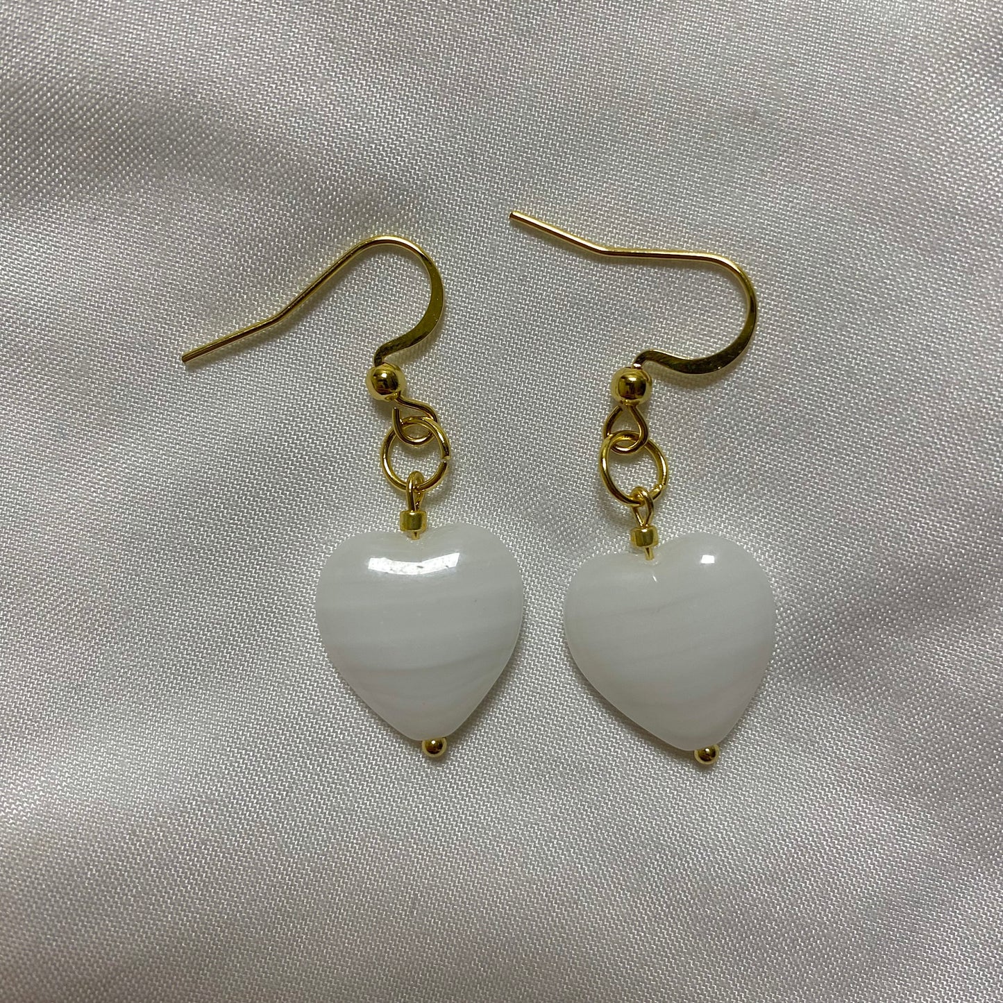 white glass heart earrings