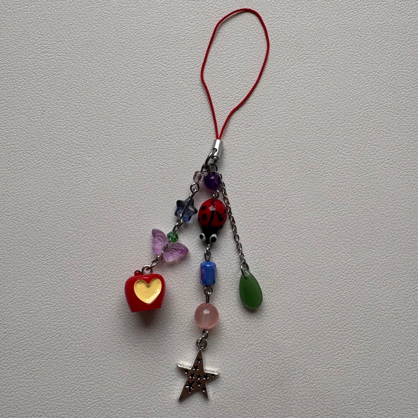 hungry ladybug phone charm