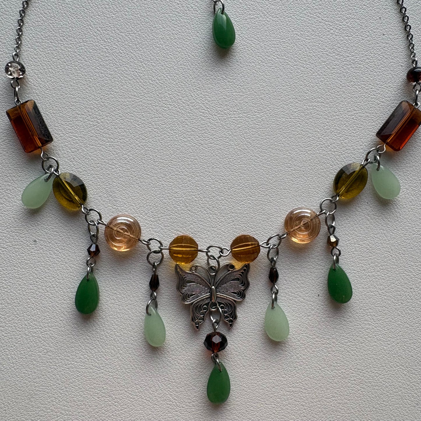brown and green butterfly necklace