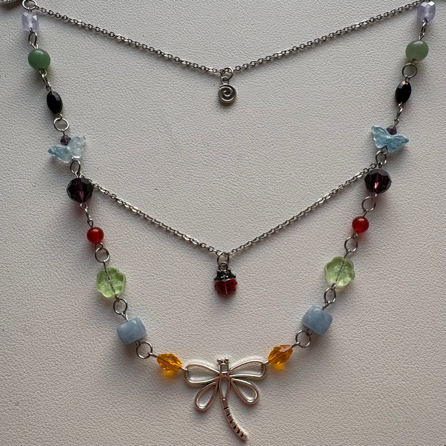 rainbow bug necklace