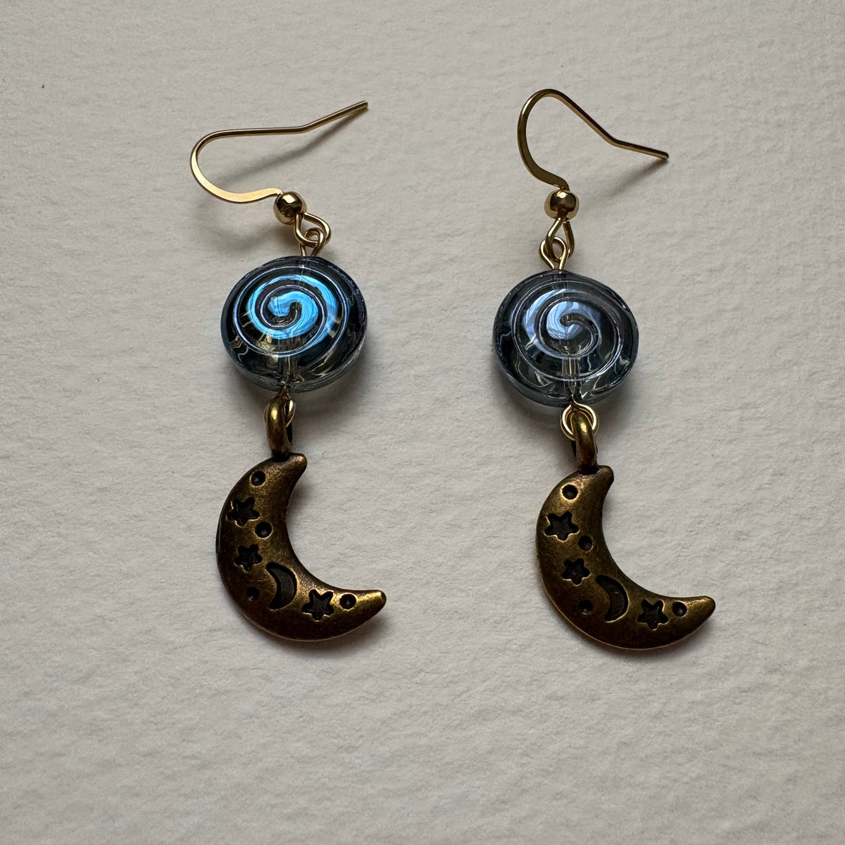 sing of the moon earrings