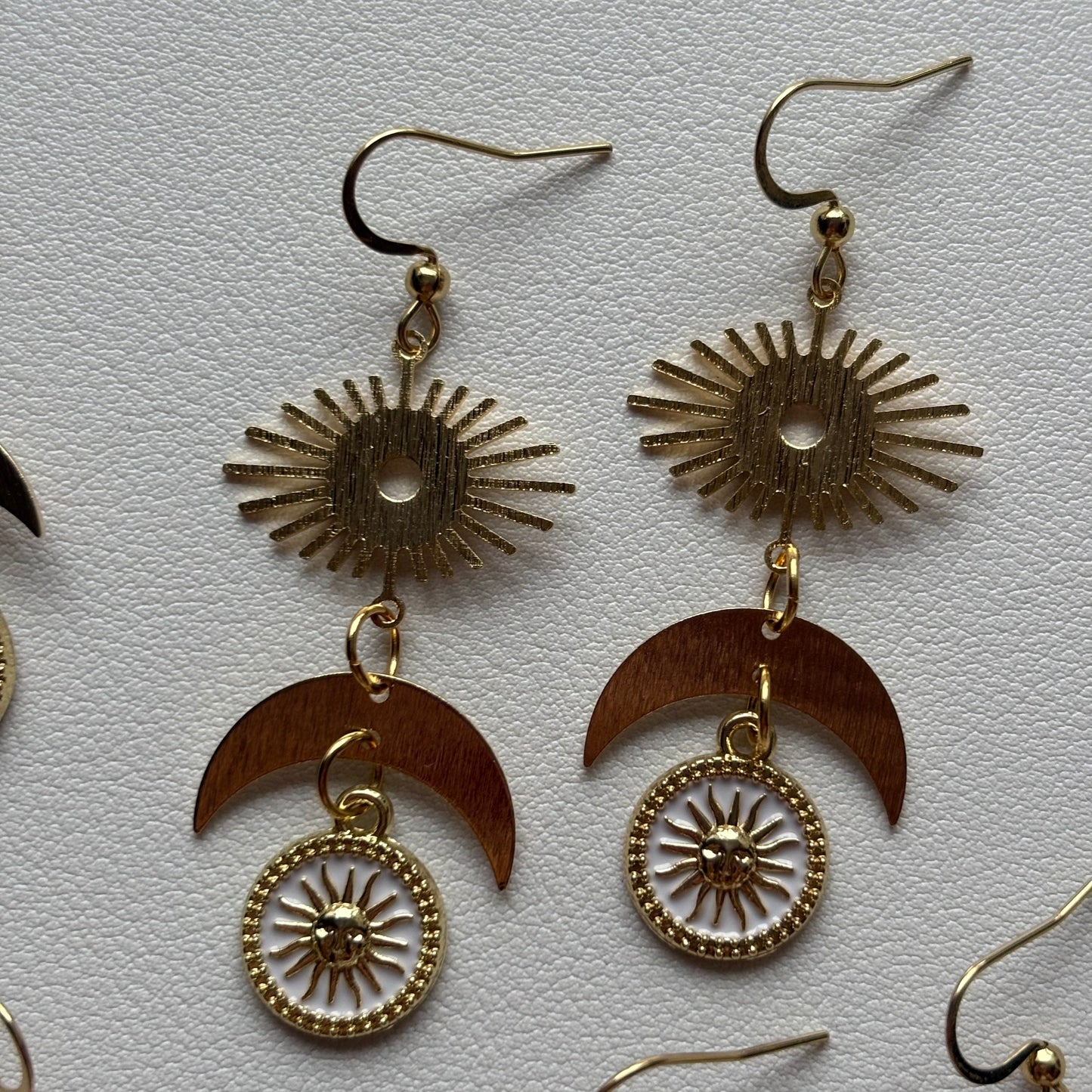 whimsical sun and moon earrings