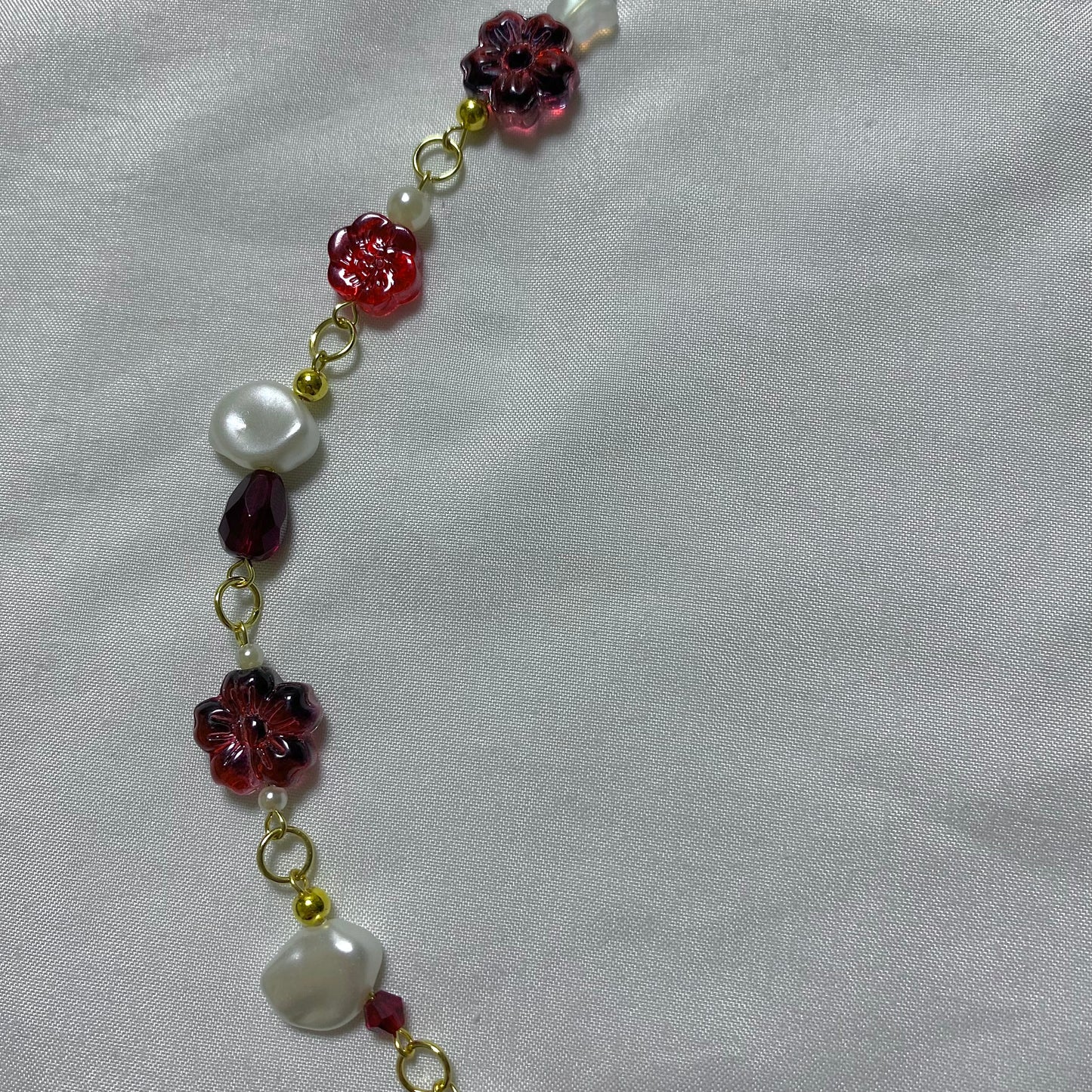 red pearl necklace