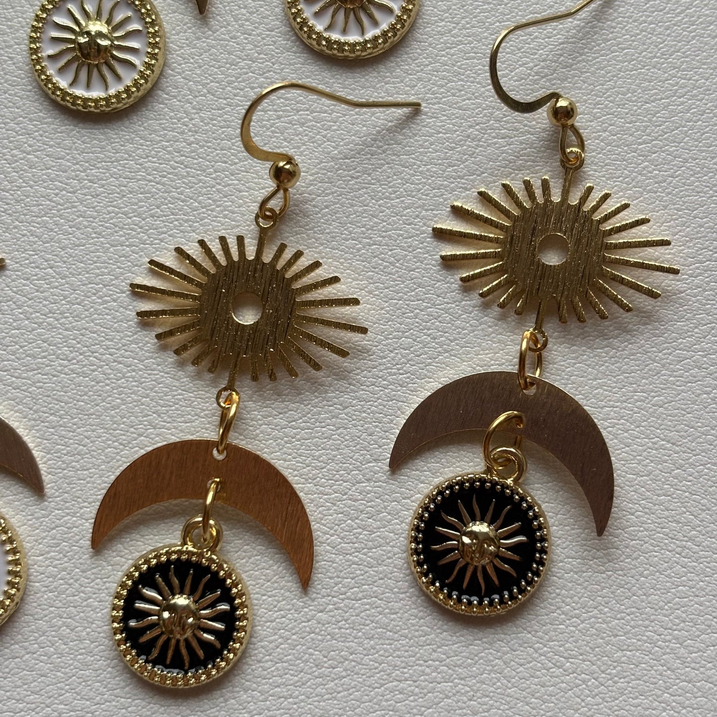 whimsical sun and moon earrings