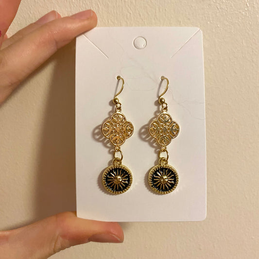 black royal sun earrings